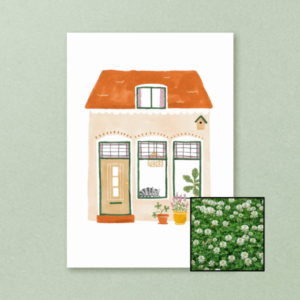 Huisje wenskaart met bloemenzaad met witte klaver