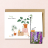 New Home wenskaart met bloemenzaad met ridderspoor
