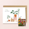 New Home wenskaart met bloemenzaad met strobloem