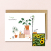 New Home wenskaart met bloemenzaad met hoge zonnebloemen